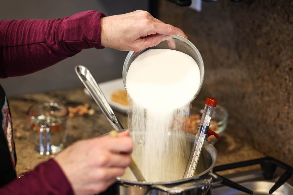 Pouring in the Sugar to create Kraken Brittle